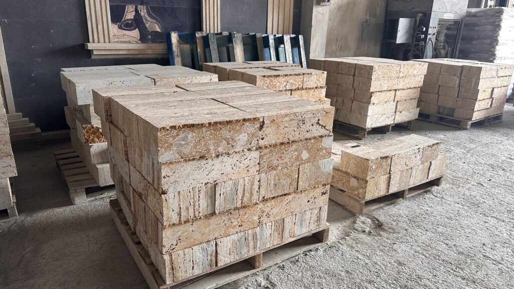 Sized Turkey travertine blocks ready for shipment on pallets at our factory